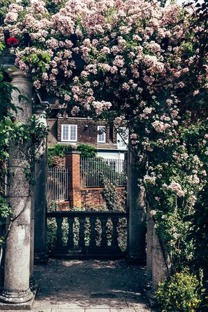 London/UK - 17/07/2019: Pergola created by garden designer T. H. Mawson in Golders Hill Park which...