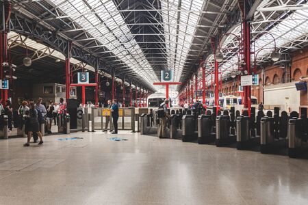 London/UK - 22/07/2019: Turnstiles leading in and out of the platforms at at the Marylebone Station, which is linking the capital to the cities of Nottingham, Sheffield and Manchester; selective focusのeditorial素材