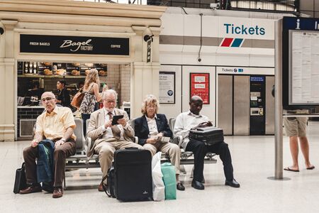 London/UK - 22/07/2019: people waiting for their train at the Marylebone Station. The station is linking the capital to the cities of Nottingham, Sheffield and Manchester; selective focus; motion blurのeditorial素材