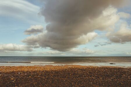 Scenic view of the beach at the North Sea side in Brora village in Scotland, UKの写真素材