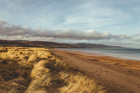 Scenic view of the beach at the North Sea side in Brora village in Scotland, UKの写真素材