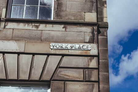 York Place street name sign on the wall of the building, Broughton, Edinburgh, Scotlandの写真素材