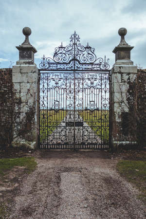 Wrought iron gate of the Dunrobin Castle in the Highland area of Scotland, looking at the Moray Firth a roughly triangular inlet of the North Seaのeditorial素材