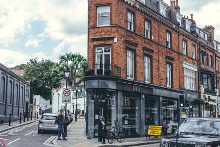 London/UK- 30/07/19: people walking past the Barget Kitchens design showroom on Heath Street in...