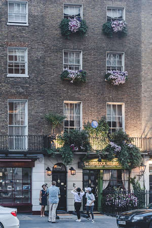 London/UK-26/07/18: tourists photographing near 221B Baker Street which is a London address of the fictional detective Sherlock Holmes, created by author Sir Arthur Conan Doyleのeditorial素材