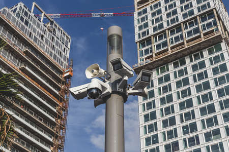 Surveillance cameras atop a pole in Tel Aviv, Israel. Video surveillance has generated significant debate about balancing its use with individuals' right to privacy even when in publicのeditorial素材