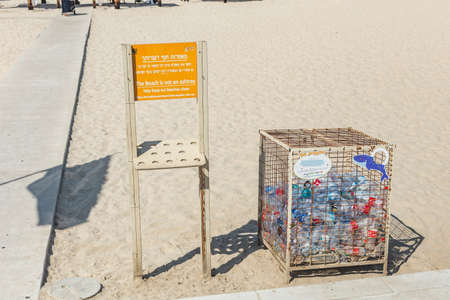 Tel Aviv/Israel-9/10/18: recycling bin for plastic beverage bottles in Tel Aviv.Plastic recycling is the process of recovering scrap or waste plastic and reprocessing the material into useful productsのeditorial素材