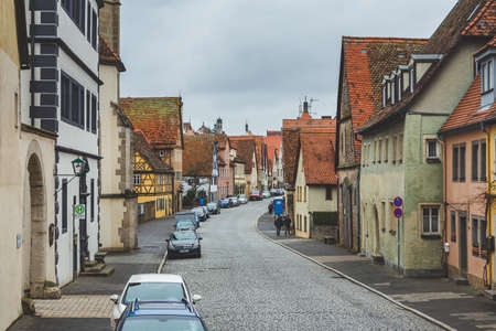 Rothenburg/Germany-1/1/19: Tile roof houses on a street in Rothenburg ob der Tauber. It is well known for its well-preserved medieval old town, a destination for tourists from around the worldのeditorial素材