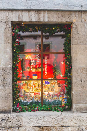 Rothenburg/Germany-1/1/19: A shop window brightly decorated for Christmas in the old town of Rothenburg ob der Tauber. The town is a well known destination for tourists from around the worldのeditorial素材