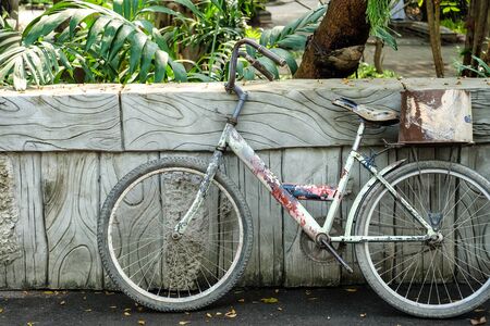 Old bicycle against the wallの写真素材