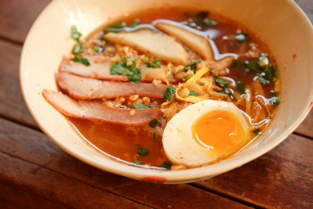 Pork noodle soup boiled eggs in a bowl.の写真素材