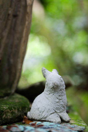 Rabbit cement statues decoration in the gardenの写真素材