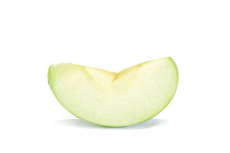 Slice of green apple on a white background.の写真素材
