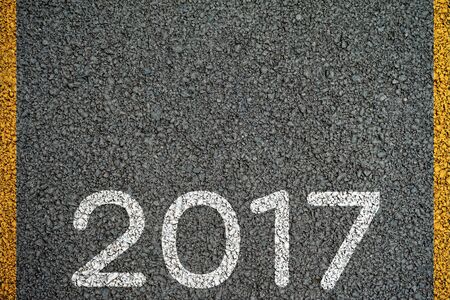 Happy New year 2017 paint on the asphalt roadの写真素材