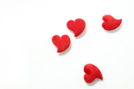 The four red hearts for Valentine's Day decorations. On a white backgroundの写真素材