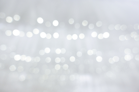 Abstract background soft white fabric clean for the wedding or Christmas with light bokeh gentlyの写真素材