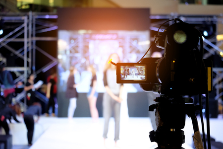 Photographer video recording activity within the eventの写真素材