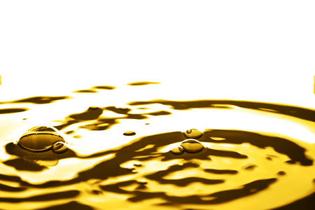 Liquid gold drop and ripple ,abstract backgroundの写真素材