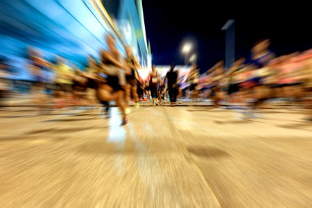 Abstract background blurred many marathon runners in the early morningの写真素材