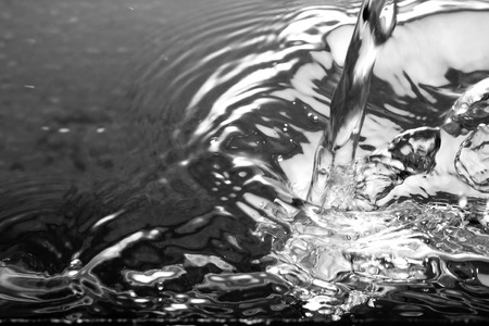 Liquid silver metal abstract ,water drops waves Bubble and ripplesの写真素材