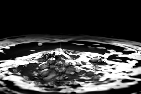 Liquid silver metal abstract ,water drops waves and ripplesの写真素材