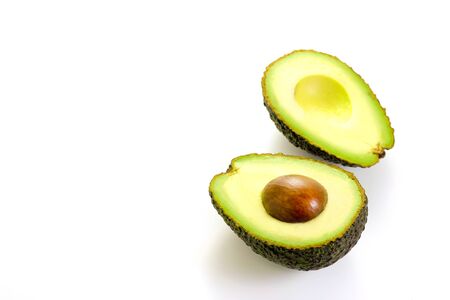 Half slice Premium Avocado New Zealand isolated on white background