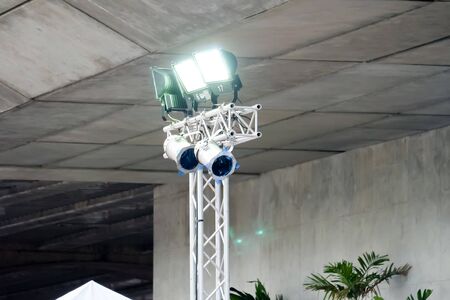 Metal halide lights on poles trust set up lighting in the eventの写真素材