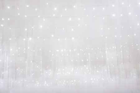 Abstract background soft white fabric clean for the wedding or Christmas with light bokeh gentlyの写真素材