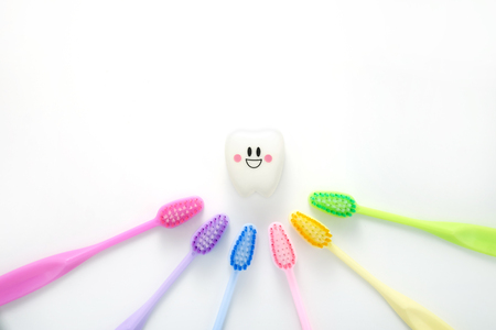 Toys teeth dental in a smiling mood with tooth brush colorfulの写真素材