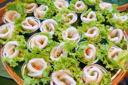 Pork Steamed Rice Dumplings with Lettuce and Chiliesの写真素材