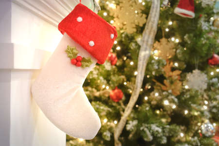 White sock to wait for gifts from santa claus decorated for Merry Christmas dayの写真素材