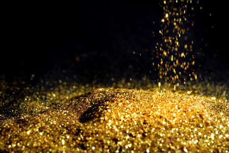 Gold dust metal sand glitter abstract background texture Luxury and elegant decorationの写真素材