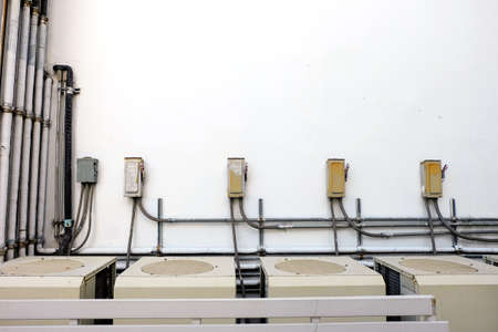 Many large air conditioning systems are outside the building or office.
