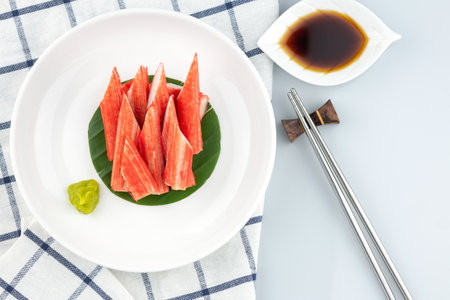 Imitation Crab Stick on a plate on white background, Japanese foodの写真素材