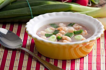 soup with radishes and prawnsの写真素材