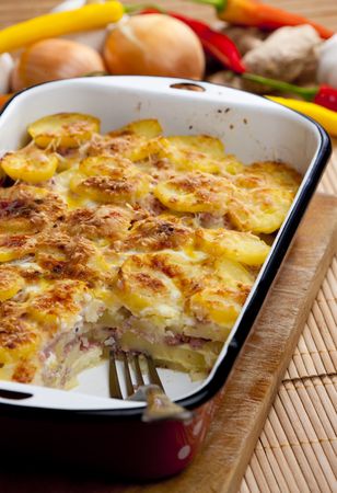 potatoes baked with smoked meatの写真素材