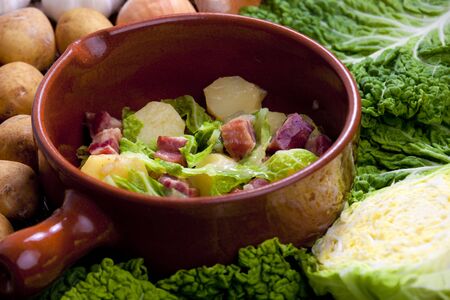 savoy cabbage with smoked meat and potatoesの写真素材