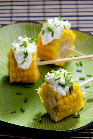 cooked corn with garlic pasteの写真素材