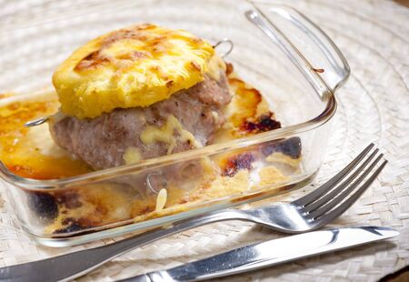 filled pork steak with pineappleの写真素材