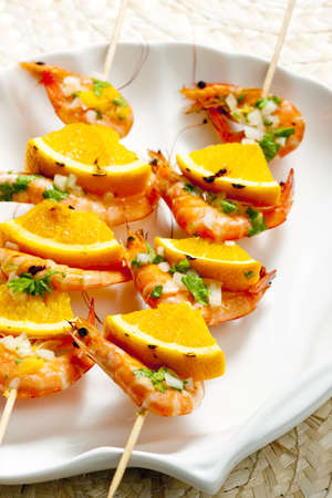prawn skewers with orangeの写真素材