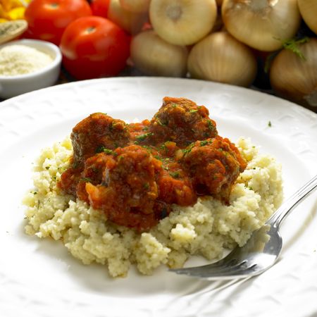 meat balls with couscous in tomato sauceの写真素材