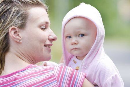 portrait of mother with her baby girlの写真素材