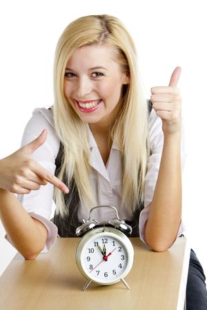 portrait of businesswoman with an alarm clockの写真素材