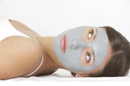 portrait of woman with facial maskの写真素材