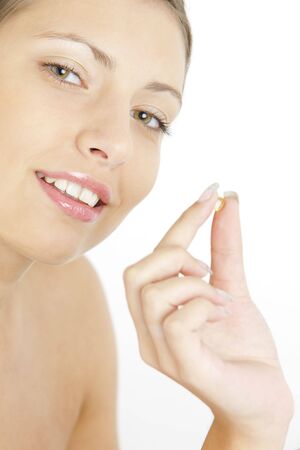 portrait of woman with vitamin Eの写真素材