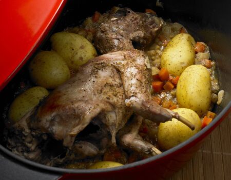rabbit with side-dish from one potの写真素材