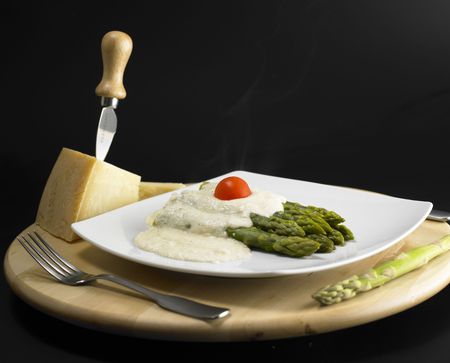 green aspargus with parmesan sauceの写真素材