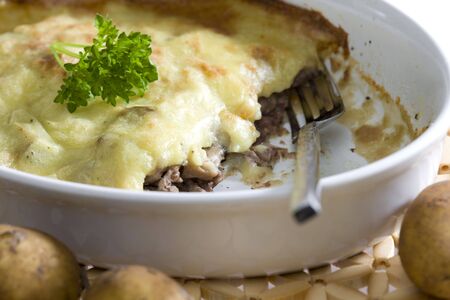 mushrooms and meat baked with mashed potatoesの写真素材