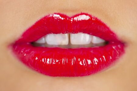 red lipstick on lipsの写真素材