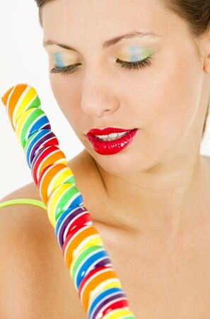 portrait of woman with a lollypopの写真素材